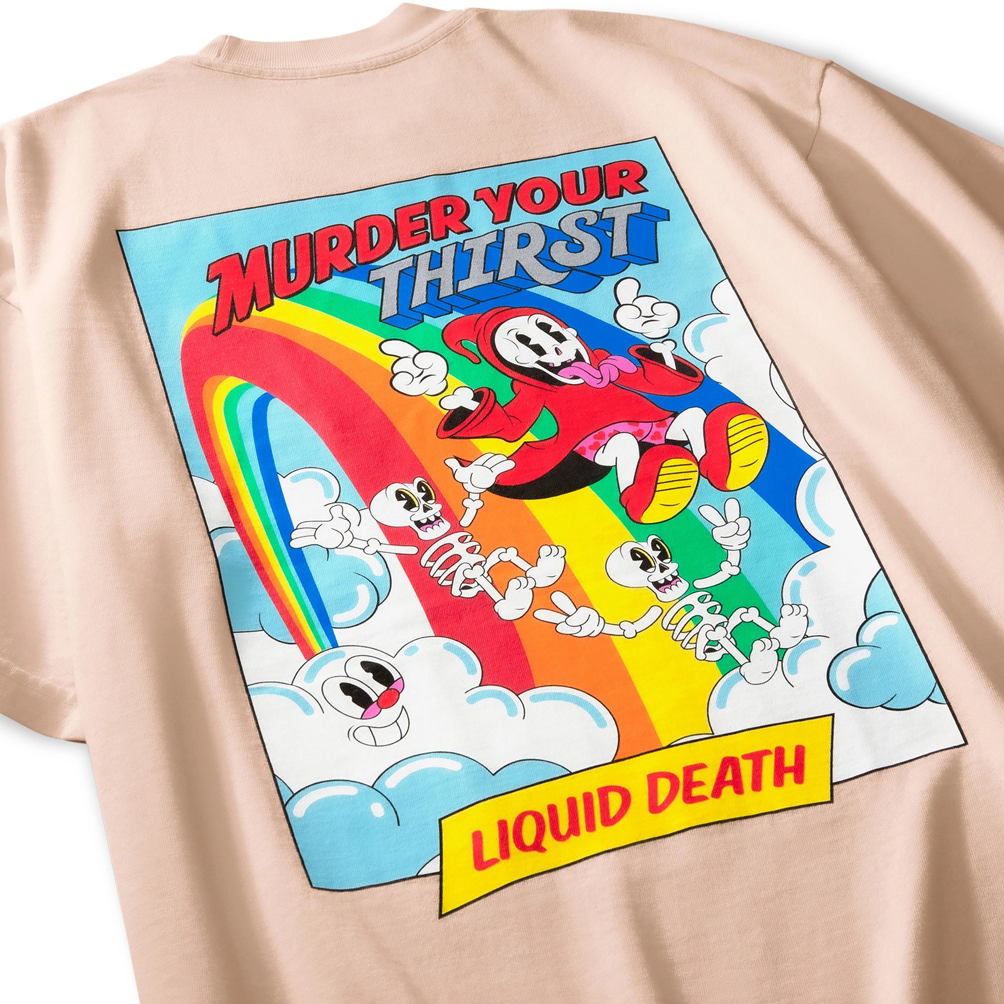 Beige t-shirt with a colorful graphic design featuring skeletons, a rainbow, and text on a white background.